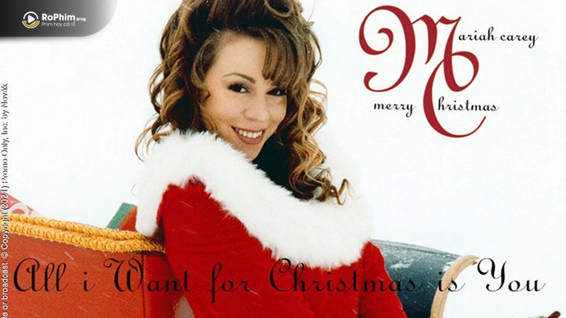 Ảnh bìa ca khúc “All I Want for Christmas Is You” của Mariah Carey với trang phục Giáng Sinh mang tính biểu tượng.