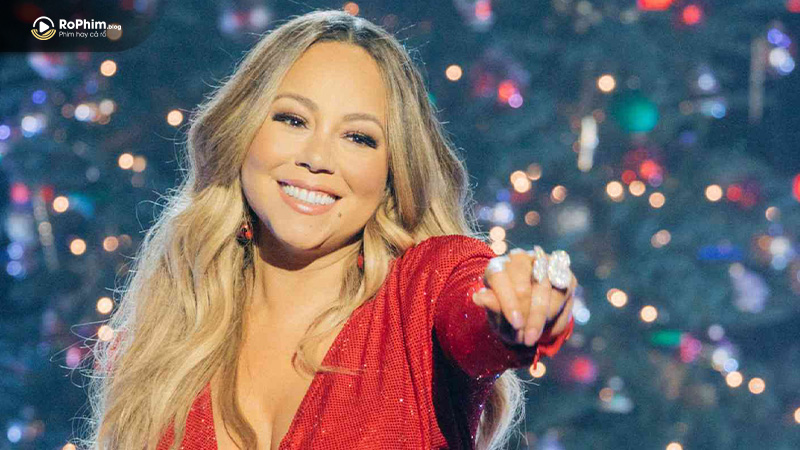 Mariah Carey trình diễn ca khúc giáng sinh All I Want for Christmas is You trên sân khấu lung linh.