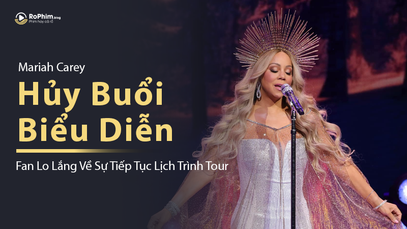 Mariah Carey trên sân khấu với trang phục lộng lẫy và vương miện ánh kim, kèm thông báo hủy buổi biểu diễn khiến fan lo lắng.